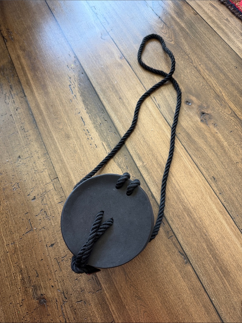 Cylinder Black rubber  Crossbody bag